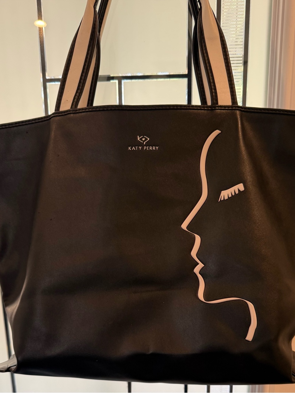 Katy Perry Collections Black Faux Leather Tote “The face” Silhouette